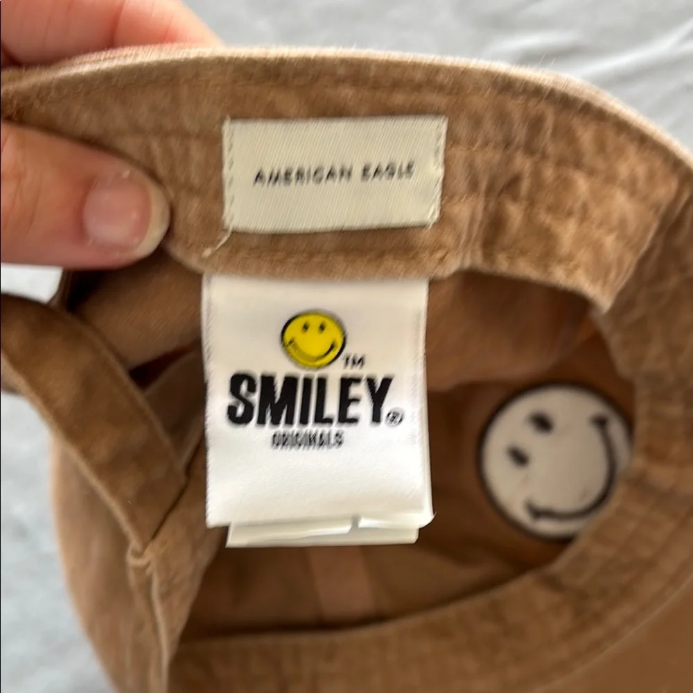 Brown and Pink Caps with Smiley Faces